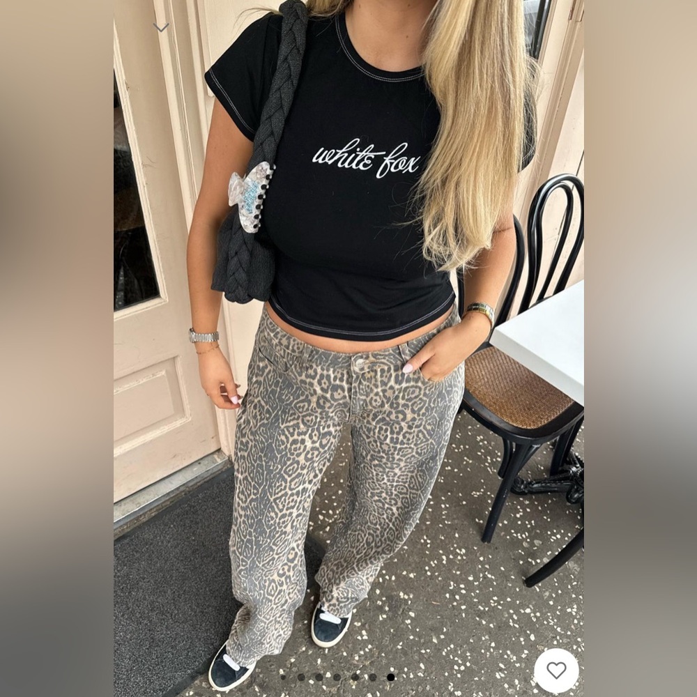 ONLY WORN ONCE! White fox wide leg low rise cheetah jeans